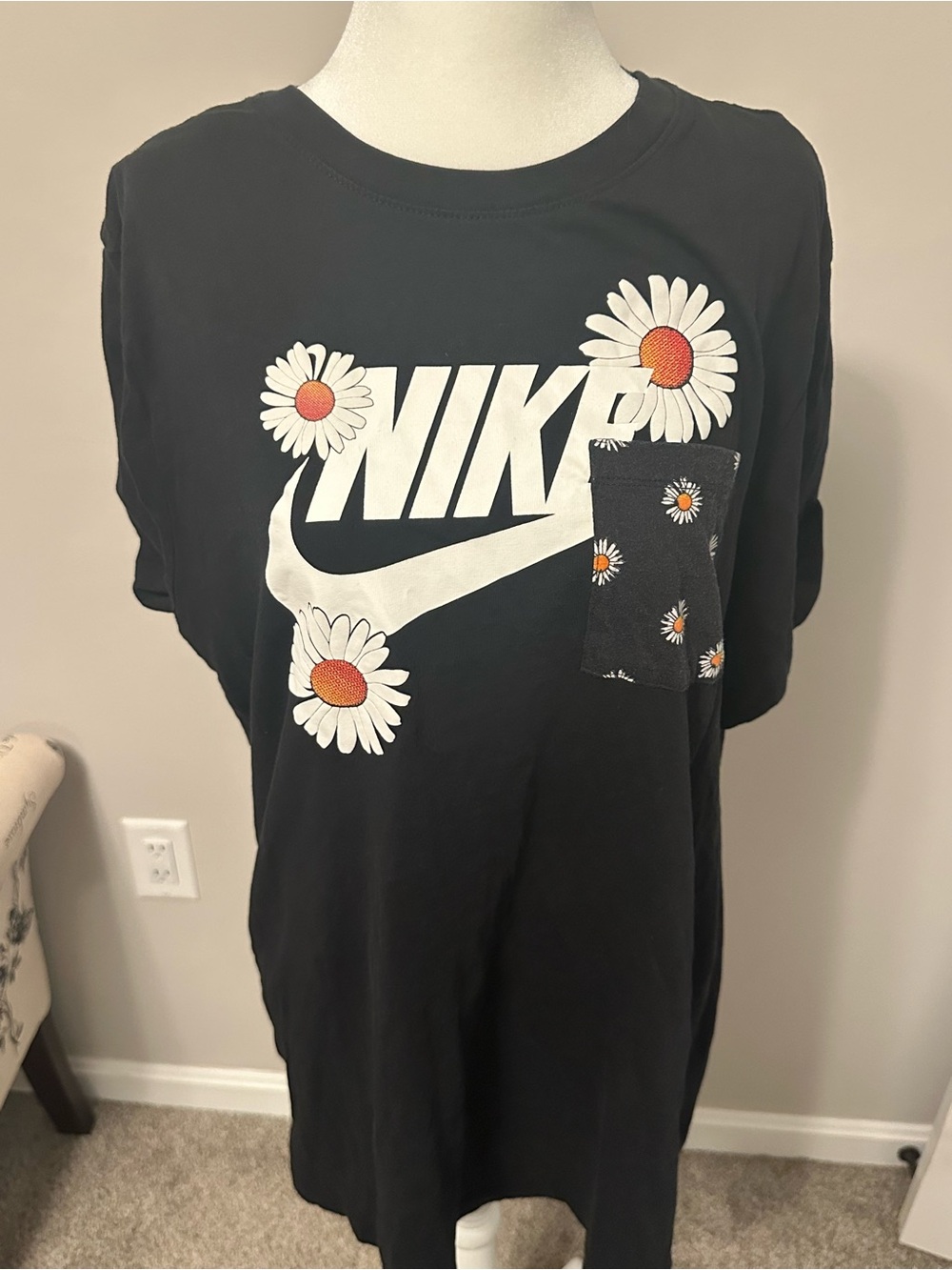Nike Black Tee with White Logo and Daisy Accents